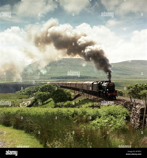 Steam train locomotive in countryside. Yorkshire. England Stock Photo ...