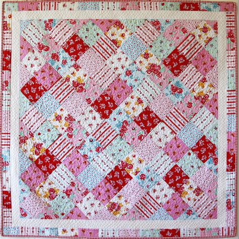 A charming quilt made with five-inch squares set on-point. The squares ...