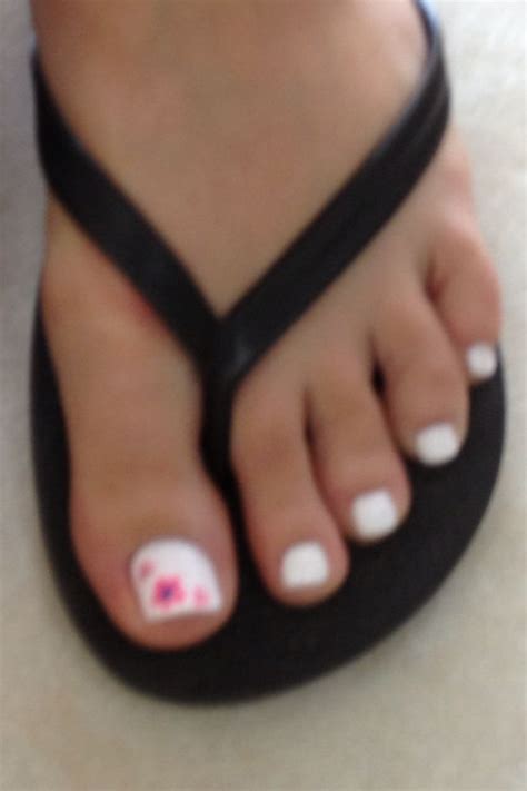 White nail polish pops the bright colors! Just saw a girl's pedicure ...