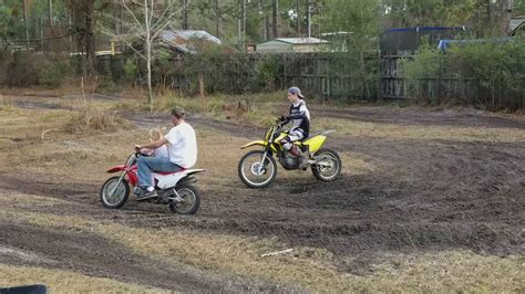 DRZ125L vs. CRF110 with 2 people Florida - YouTube