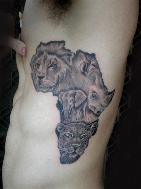 African Animals Tattoos On Side Rib | African tattoo, Africa tattoos ...