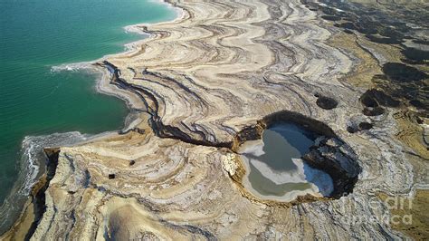 Elevated view of sink holes, Dead Sea, Israel f1 Photograph by Dan Yeger - Fine Art America