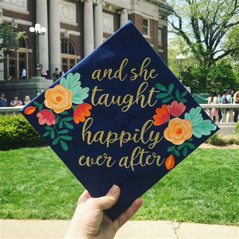 a graduation cap that says and she taught happily ever after