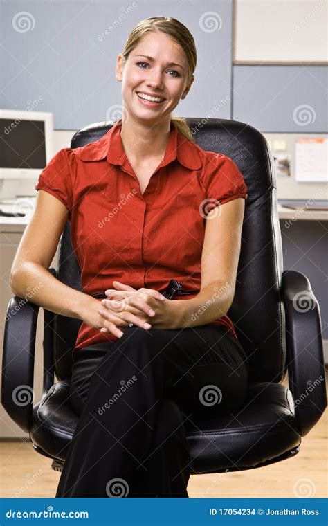 Businesswoman Sitting in Chair Smiling Stock Photo - Image of people, western: 17054234