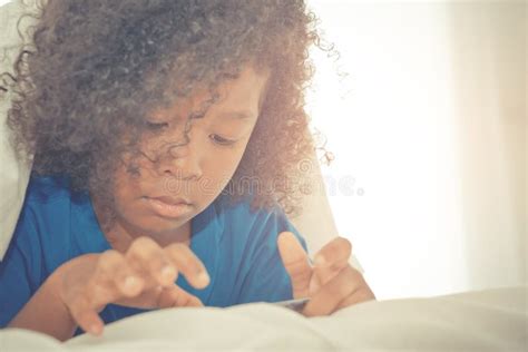 Little Kid Playing with Smartphone on Bed Stock Image - Image of technology, internet: 112982709