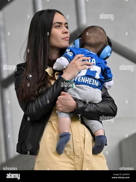 Mija Curkovic, woman, player's woman of Andrej Kramaric TSG 1899 Hoffenheim with child in the ...