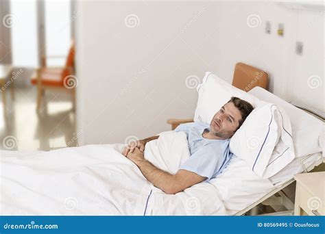 Young Patient Man Lying at Hospital Bed Resting Tired Looking Sad and Depressed Worried Stock ...