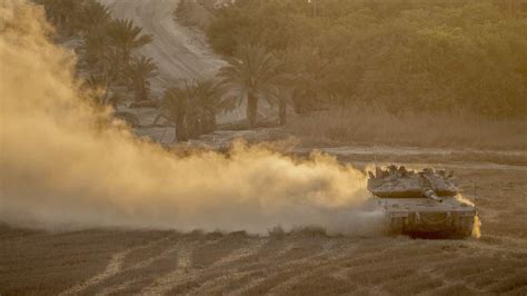 Israel-Hamas Ceasefire Begins As Troops Leave