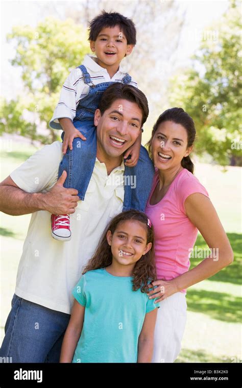 Family outdoors smiling Stock Photo - Alamy