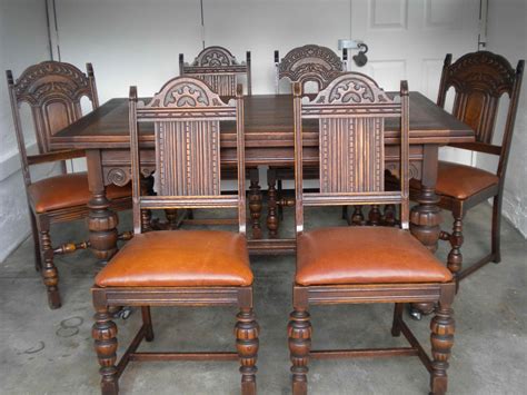 Antique English Oak Dining Table and 6 chairs with leather bottoms | InstAppraisal