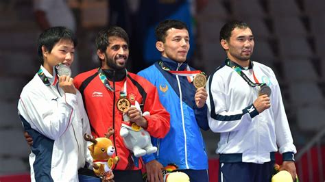 In Pics- Asian Games 2018: India's medals, winners, matches and results on Day 1