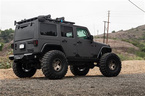 Completely Blacked Out Jeep Wrangler Shod in Off-Road Yokohama Tires and Black Rhino Wheels ...