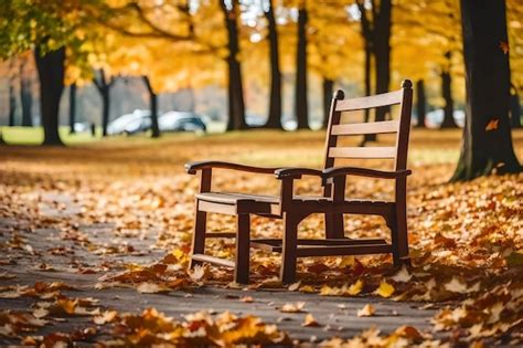 Premium AI Image | a wooden chair in a park with autumn leaves on the ground