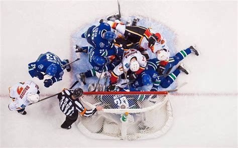 After strong starts to season, Flames and Canucks are rapidly ...