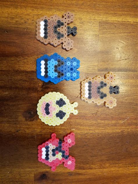 1st game characters made from perler beads. Sorry for the bad lighting ...