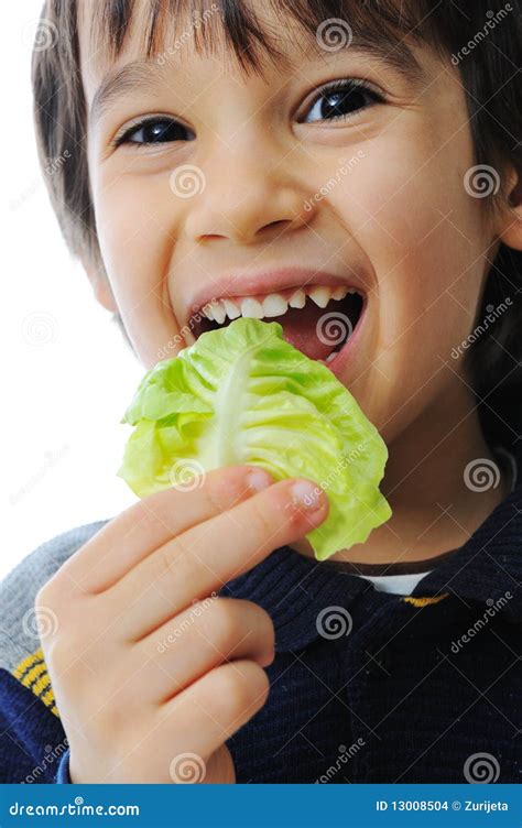 Kid eating salad stock photo. Image of mediterranean - 13008504