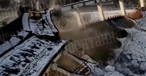 Dramatic video shows Russia stadium collapse with worker on roof - CBS News