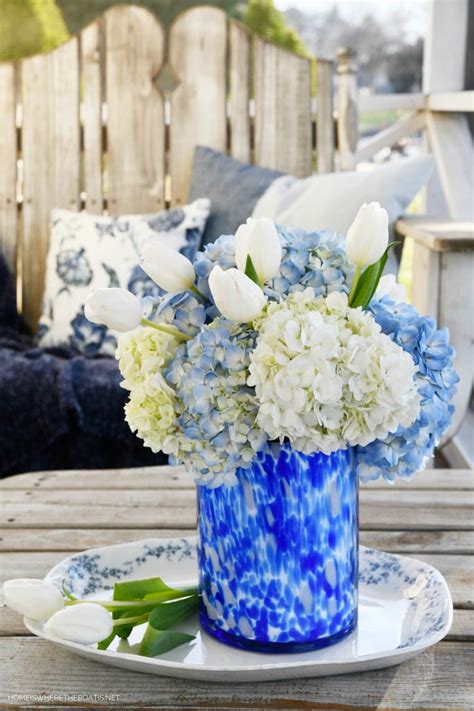 January Blues and Blooms on the Porch | Winter flower arrangements, Blue flower arrangements ...