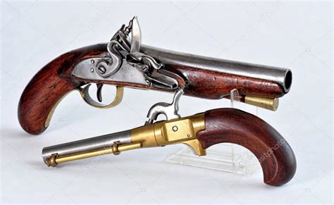 Old Antique Pistols. Stock Photo by ©mj0007 93658822