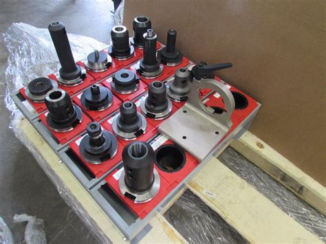 Machines Used | (16) Assorted Cat 50 Tool Holders with Benchtop Rack