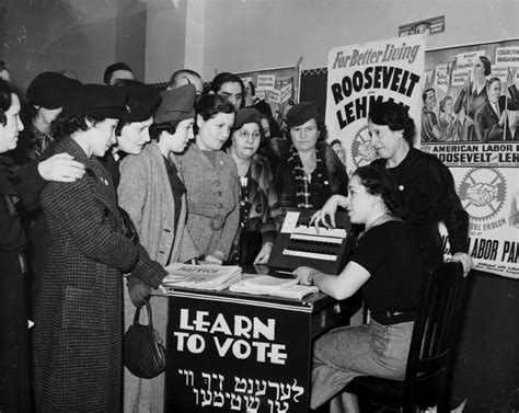 Women surrounded by posters in English and Yiddish support… | Flickr