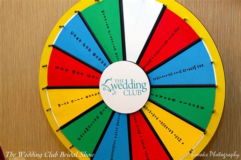 a colorful wheel of fortune with the words true wedding club on it's side