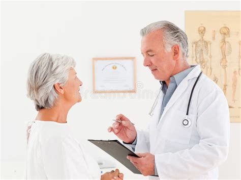 Senior Doctor Talking With His Sick Patient Royalty Free Stock Photo - Image: 18108345