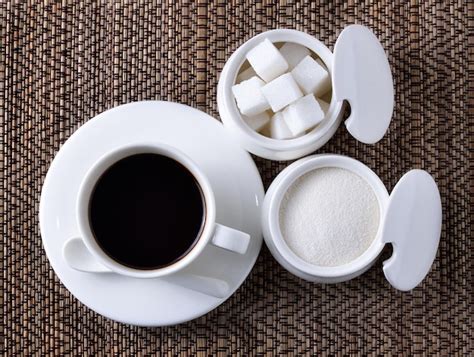 Premium Photo | Coffee cup on a wooden table