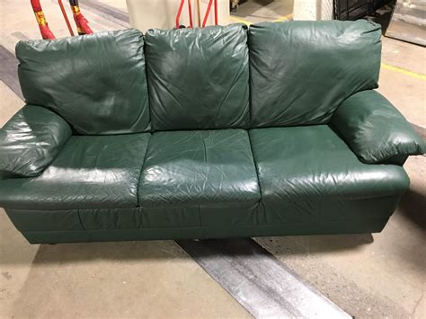 green leather sofa | Adelante Development Center