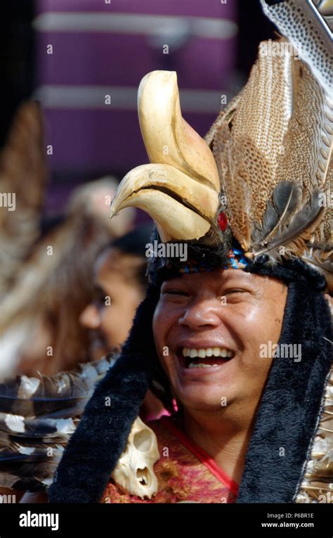 Iban man in traditional dress, Gawai festival, Kuching, Borneo, Sarawak, Malaysia with hornbill ...