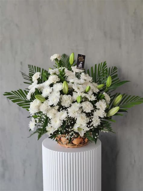 Peaceful White Lilies In A Basket | Same Day Delivery | BahrainGreetings