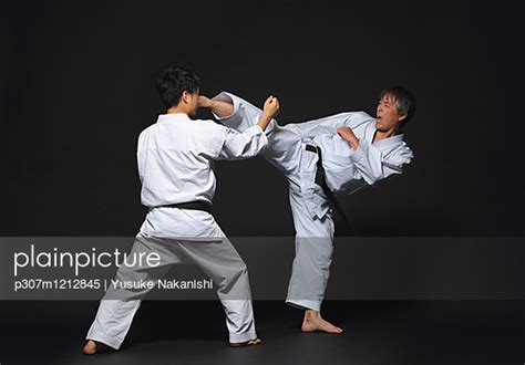 Japanese karate masters fighting - Stock Image - Everypixel