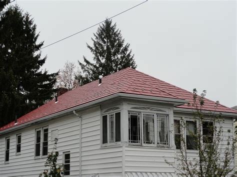 Metal Roofing vs Asphalt Shingles | The Sietch Blog