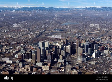 aerial view above Denver Colorado skyline to Rocky Mountain Front Range mountains Stock Photo ...