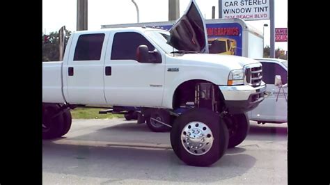 Ford F-550 Super Lift with Airbags, lambo doors and custom bed - YouTube