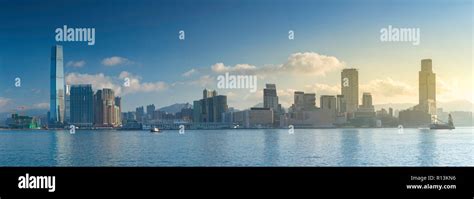 Skyline of Tsim Sha Tsui at sunrise, Kowloon, Hong Kong Stock Photo - Alamy