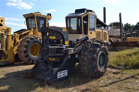 DF703 3 WHEEL FELLER BUNCHER W/ SAW HEAD W/ ENCLOSED CAB HEAT & AIR 151 HOURS