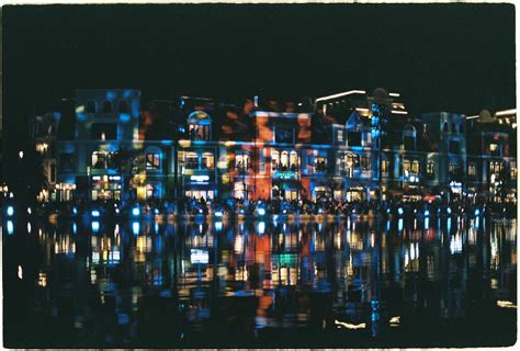 City Buildings in Lights at Night · Free Stock Photo