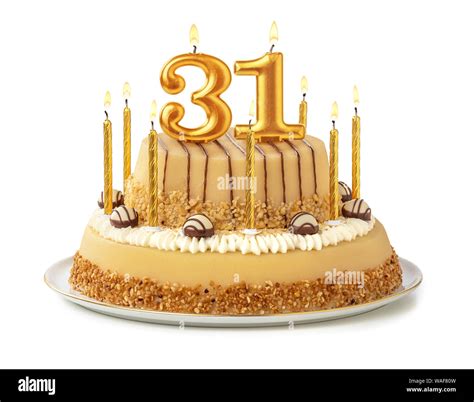 Festive cake with golden candles - Number 31 Stock Photo - Alamy