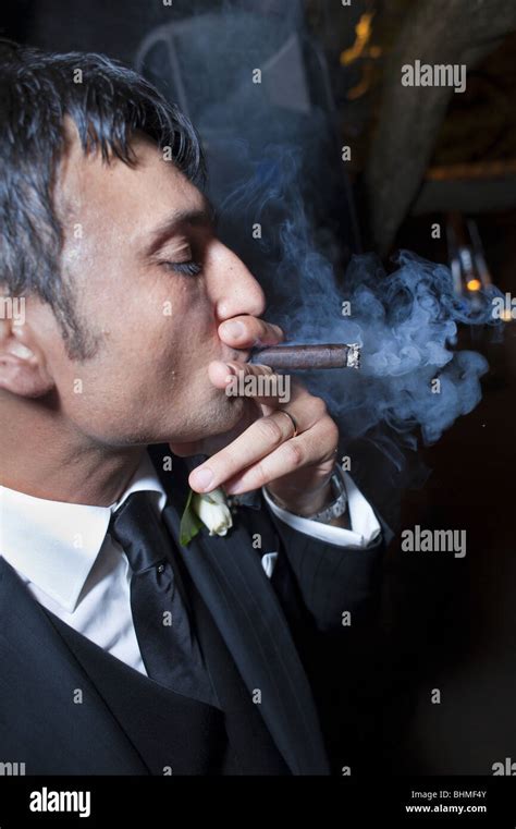 Cigar smoke hi-res stock photography and images - Alamy