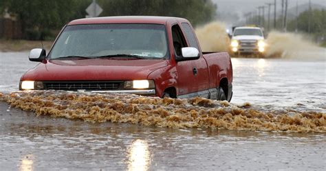 Arizona flash floods leave freeways closed, drivers stranded - CBS News