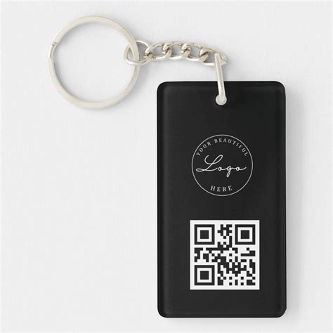 a black key chain with a qr code on it