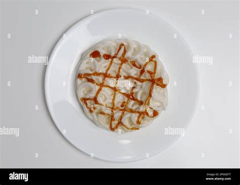 Kerupuk putih or kerupuk kaleng is Indonesian traditional crackers, isolated on white background ...