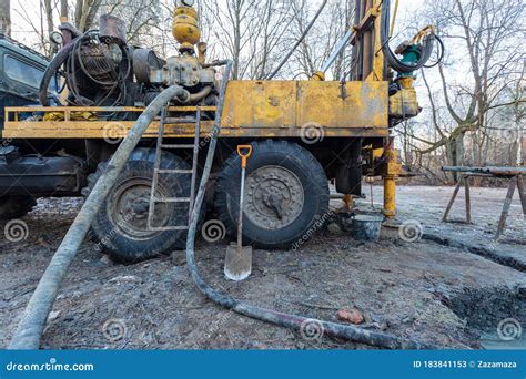 Hydraulic Ground Water Hole Drilling Machine Installed on the Old Truck ...