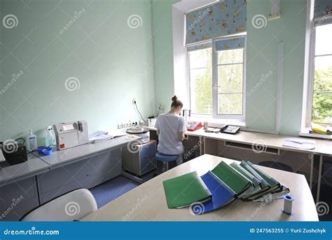 At a Hospital Laboratory. Lab Technician Performing Analysis of Blood Samples with Gas ...