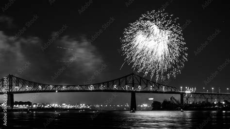 Photograph of fireworks. Jacques Cartier bridge with fireworks ...