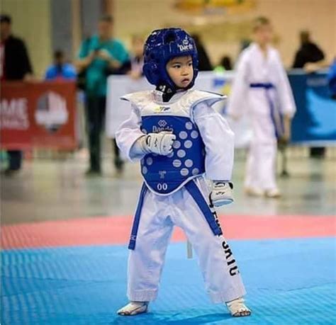 This picture of a kid at a taekwondo tournament represents what I do almost every day ...