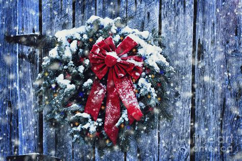 Christmas Wreath In Snow Storm Photograph by Stephanie Frey