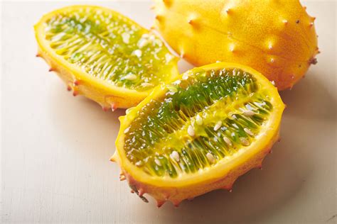 Red Spiky Fruit With Orange Center