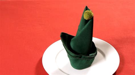 How to Fold a Napkin into an Elf Hat | Napkin Folding - YouTube